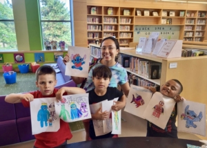 Achievers displaying their artwork